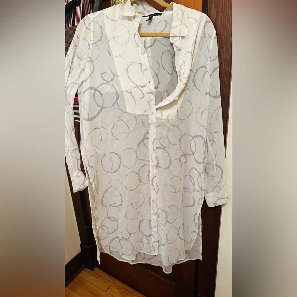 BCBG medium tunic. Transparent. Classy top over tight pants with tank top